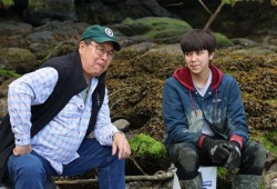 Elder Vince Smith takes five with his grandson Keelahn Hanson.