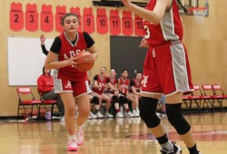 Jaidin Knighton, seen passing during the 2024 Totem tournament, is among the many veterans on this year's Alberni girls team. (Alexandra Mehl photo) 