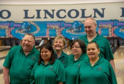 Louise Johnny, front left, won a silver medal with her bowling team at the games.