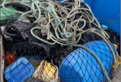Buckets and rope are collected from the ocean. The federal government is funding 43 ghost gear projects this year. (T. Buck Suzuki Foundation)