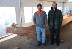 Hipolite Williams, carver, and apprentice Cooper Styan at Nucci, the location of where the carving took place. (Alexandra Mehl photo)
