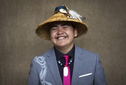 Rave Sutherland of the Hesquiaht First Nation poses for a portrait at the Nuu-chah-nulth Tribal Council Graduation ceremony held at the Alberni District Secondary School in Port Alberni, on June 11, 2022.