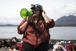 Marissa Mack speaks George Floyd's final words as protestors lay down on the first street dock in Tofino for 8 minutes and 46 seconds Ð the same amount of time George Floyd was pinned down under the knee of Minneapolis police officer, Derek Chauvin.