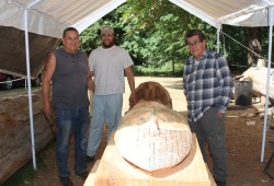 Alton Watts, left, worked on a 20-foot totem pole at Watts’ property in Port Alberni with Alan Heta and Tim Paul. (Eric Plummer photo)