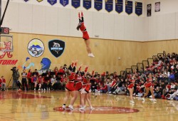 The Alberni Cheer team impresses the Totem crowd with their acrobatics.