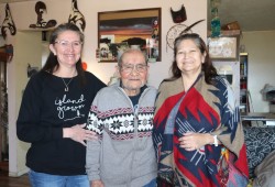 Cody Gus in his home with daughters Sam (left) and Gloria, on the day before the Tseshaht elder turned 93 on March 16. He died on Aug. 7. (Denise Titian photo)