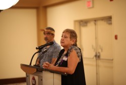 Tseshaht Councillor Deb Foxcroft speaks at the overdose awareness event with fellow member Aaron Watts.