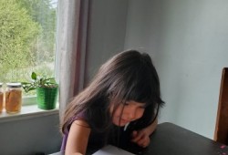 Olivia Titian works on the alphabet at her home in Ahousaht. (June Titian photo)