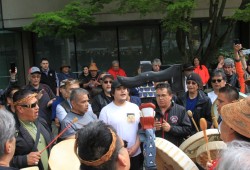 Nuu-chah-nulth-aht sing in front of the B.C. Supreme Court in Vancouver on April 19, 2018, after the ruling was announced from a round of litigation on their fishing rights, part of the Ahousaht et Al. case. (Eric Plummer photo)