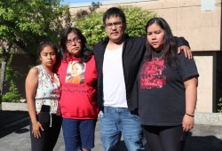 Dontay's father Patrick Lucas stands with family outside the Port Alberni Law Courts on June 12, 2023 when a preliminary inquiry was underway for murder charges in his son's death. (Denise Titian photo)