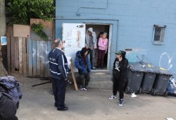 Port Alberni Fire Department Chief Mike Owen explains to residents of the Port Pub why they can't live there anymore. The eviction occurred May 29. (Denise Titian photo)