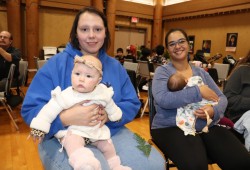 Jessica & Emersyn (mom Jessica is wearing glasses and long-sleeved blue shirt, pictured with Day and Solana)