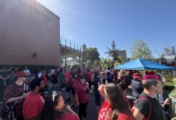 Many marchers wore red, a colour that has become symbolic in the movement to honour missing and murdered Indigenous women, girls, and Two-Spirit people.