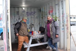 Leon Titian (right) stands with others behind the Safe Injection Site facility in Port Alberni in April 2022. (Denise Titian photo)