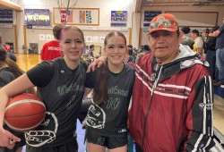 Dwayne Martin with his daughters Wiinuk (Nunu), left, and Helen right before the championship final.  