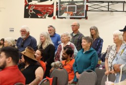 Those who participated in the 1984 blockade on Meares Island stand up to be recognized at Tofino's Wickaninnish Community School on June 21.