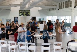 The group shares a song and dance which is done at many gatherings on the west coast of Vancouver Island, as they celebrate the signing of a Cooperation and Friendship Agreement.