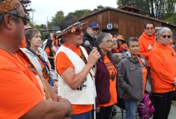 Randy Red speaks with other survivors of the Alberni Indian Residential School, on the former site of the institution on Sept. 30, 2024, which was National Day for Truth and Reconciliation. (Eric Plummer photo)