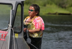 Hupacasath member Roxanne Tatoosh drives her boat along the Somass River. Each year the Hupacasath and Tseshaht First Nations have Economic Opportunity agreements with DFO to commercially harvest from the river. 