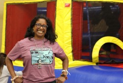 Biosphere researcher Sharmalene Mendis-Millard volunteers at the bouncy castle during the milestone event. 