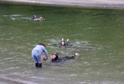 People with the Bamfield Swim Team were welcomed to the Pachena River, after crossing Pachena Bay.