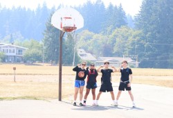 Hot Dogs team from left: Wiinuk Martin, Brielle Tom, Vaughn Robinson and Cassius Robinson went for a swim after the 3x3 tournament was cancelled.