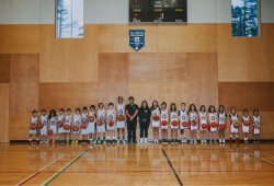 Yuułuʔiłʔatḥ U13 Ravens boys squad and U13 West Coast Thunderbirds girls team line up for a group pic before making the big trip north to the JANT in Terrace, B.C. last year. (Jen McLeod photo)