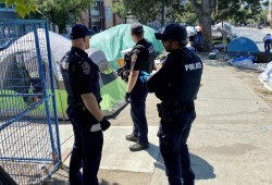 In the summer of 2024 Victoria police disassembled an encampment on Pandora Avenue, after a paramedic was assaulted while responding to a call on the street. (Victoria Police Department photo)