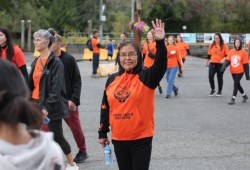 Participants pass by the Clutesi Haven Marina, on their way to conclude the walk at the Alberni Athletic Hall.