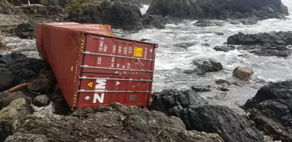 A shipping container from Zim Kingston is pictured on Cape Palmerston Beach. (Photo by Epic Exeo)  