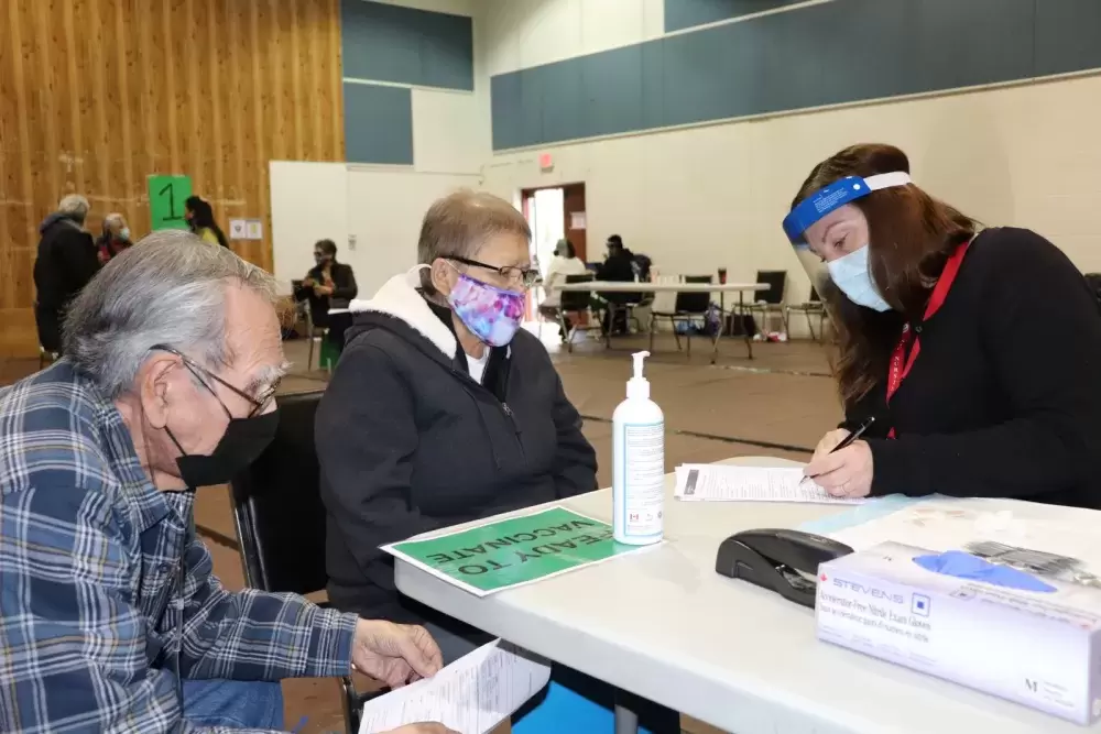 Tseshaht members Alfred and Euphrasia Dick received their first COVID-19 shots, when NTC nurses brought Moderna doses to Maht Mahs on March 4, part of community immunization clinics being held across the province this month for on-reserve First Nations members. (Denise Titian photo) 