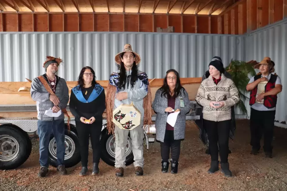 Makah carver Micah McCarty (far left) stands with Sarah Wright Cardinal, carving apprentice Trystan Dunn-Jones and Shelia Jones, who coordinated cultural revitalization programs for Pacheedaht youth. (Denise Titian photo)