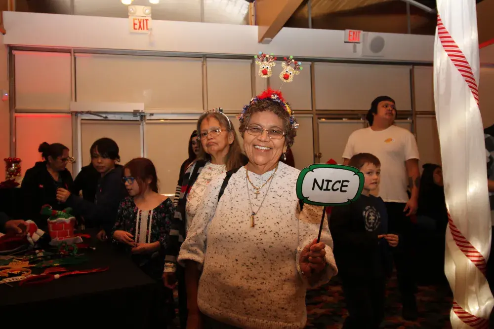 Cathy Rask heads into the photo booth.