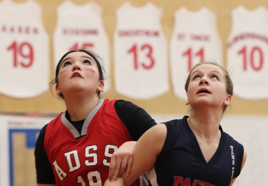 Alberni player Hayleigh Watts, left, watches the ball at the Totem finals in January 2024. (Alexandra Mehl photo) 