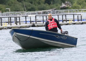 Coach Peter Amos overseeing activity on the water