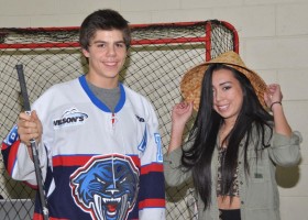 Connor Logan presents Addie Elliot with one of his grandmother's woven cedar hats