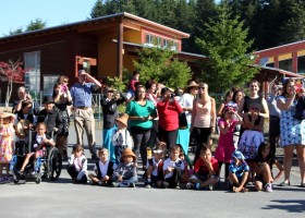 Children watched as the Ditidaht community welcomed the Prince and Princess