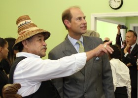 Chief Jack Thompson shows Prince Edward community member's photos on the walls of the library