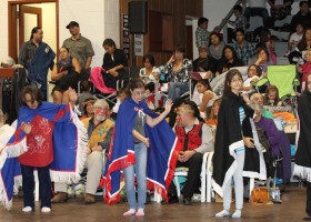 Ladies dancing in front of Haggard family