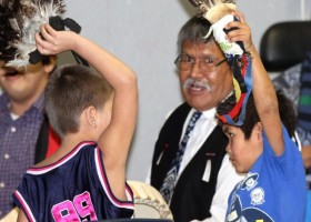 Tyee Ha'wilth Maquinna Lewis George with young singers