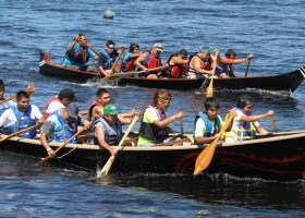 Final heat with the Ahousaht team pulling ahead of Tseshaht near the finish line