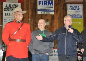 Peter Zebersky (right) introduces Sidney RCMP Const. Ravi Gunasinghe and Green Party leader Adam Olsen