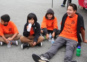 The boys wait for some lunch